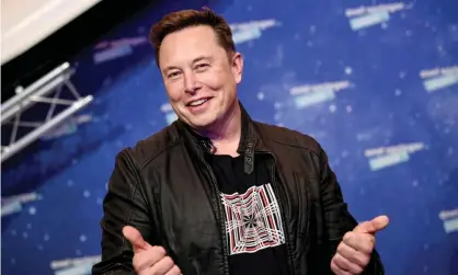  ?? Photograph: Britta Pedersen/EPA ?? Elon Musk in Berlin last week. Musk said of California: ‘If a team is winning for too long, they tend to get complacent.’