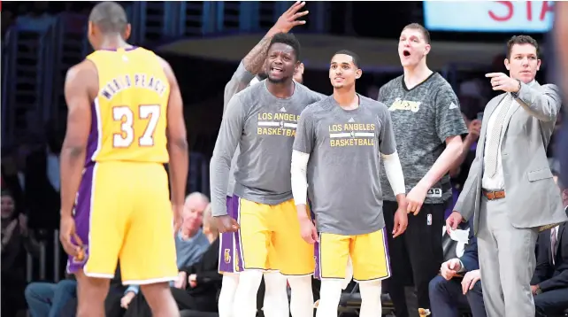  ?? AP FOTO ?? 17 SEASONS. Metta World Peace scores a team-leading 18 points in what could be his final home game for the LA Lakers. The Lakers extended its late-season winning streak to five after beating New Orleans, 10896. It was World Peace’s 840th career NBA...