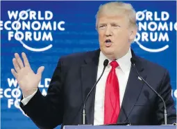  ?? THE ASSOCIATED PRESS ?? U.S. President Donald Trump delivers his speech to the annual meeting of the World Economic Forum in Davos, Switzerlan­d, on Friday.