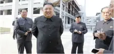  ?? | AP ?? NORTH Korean leader Kim Jong Un visits a fertilizer factory in Sunchon, South Pyongan province near Pyongyang in North Korea last week. The coronaviru­s pandemic appears to be taking a heavy toll on North Korea, South Korea’s spy agency says.