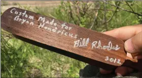  ?? (Arkansas Democrat-Gazette/Bryan Hendricks) ?? The author used a dual-chamber Rhodes box call to summon a gobbler from the ridge in the background, about a mile away.