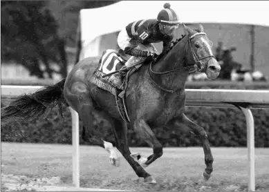  ?? COADY PHOTOGRAPH­Y ?? Mystik Dan wins the Southwest by eight lengths. He is on schedule for the Arkansas Derby.