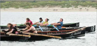  ??  ?? With 10 boats in the race, the Rás Fear agus Bean provided an intense contest at Regatta Fionn Trá on Sunday. The eventual winners were John Joe Hussey and Siobhán Goodwin in boat number 16.
