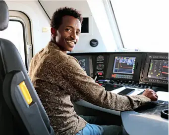  ?? ?? A driver prepares before starting the train at the Nagad Railway Station along the Ethiopia-Djibouti Railway in Djibouti on 19 September 2022