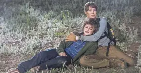  ?? EMERSON MILLER/WARNER BROS. ?? Angelina Jolie and Finn Little in a scene from “Those Who Wish Me Dead.”