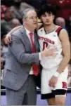 ?? NAM Y. HUH — ASSOCIATED PRESS ?? Rutgers head coach Steve Pikiell, left, and guard Geo Baker react during the second half Big Ten Conference tournament in Chicago on Wednesday. Nebraska won 68-61.