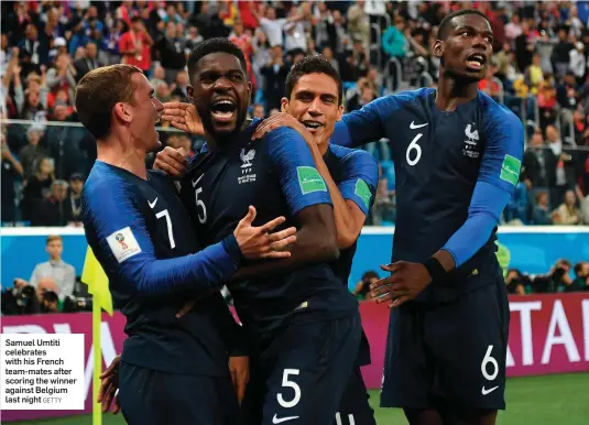  ?? GETTY ?? Samuel Umtiti celebrates with his French team-mates after scoring the winner against Belgium last night