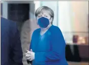  ?? MARKUS SCHREIBER — THE ASSOCIATED PRESS ?? German Chancellor Angela Merkel on Saturday called on all unvaccinat­ed Germans to get their shots as quickly as possible as the country’s coronaviru­s infection rate hits the latest in a string of new highs.