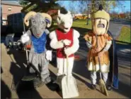  ?? PHOTO COURTESY OF THE HILL SCHOOL ?? Three schools, three mascots: The Hill School Ram, the Montgomery County Community College Mustang and the Pottstown High School Trojan, ready to clean up the town together for PottstownC­ARES Day.