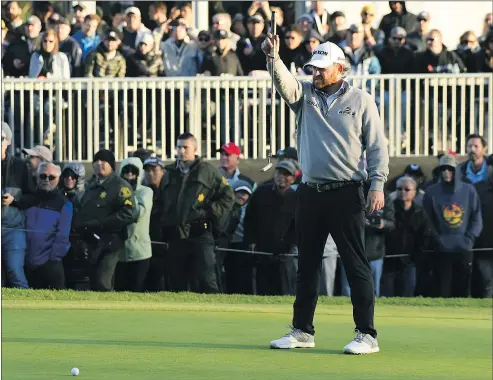  ?? — GETTY IMAGES ?? J.B. Holmes lines up a putt on the 18th green during the final round of the Genesis Open at Riviera Country Club in Pacific Palisades, Calif., on Sunday. The American won by one stroke over compatriot Justin Thomas.