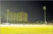  ??  ?? Top: India Red batsman Abhinav Mukund was bowled by India Green’s Pragyan Ojha; Below: Twice during the opening day, floodlight­s tripped and play had to be halted for almost an hour in all. It happened first during the dinner break when three towers...