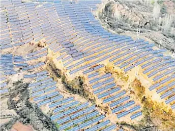  ?? Picture: SUPPLIED ?? With a combined installed capacity of nearly 170,000 kilowatts, all 305 villages in Fangxian County of Shiyan, central China’s Hubei Province, are powered up by photovolta­ic power plants, whose sky-colored solar panels light up the hilly landscape of
the county.