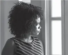  ?? Associated Press ?? ■ Cecilia Roberts poses for a photo inside her home Sunday in Lithonia, Ga. The need for long-term and specialize­d care to treat child sex-traffickin­g victims is increasing as the focus across the U.S. shifts from punishment to treatment. A residentia­l facility in Texas opened recently amid a makeshift response nationwide to a growing population of child sex-traffickin­g victims. Roberts went to such a facility in Georgia. She says, “As a child, it was all that I needed, just peace, and a little bit of attention and love.”