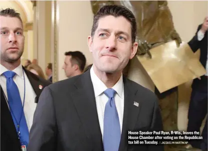  ?? | JACQUELYN MARTIN/ AP ?? House Speaker Paul Ryan, R- Wis., leaves the House Chamber after voting on the Republican tax bill on Tuesday.