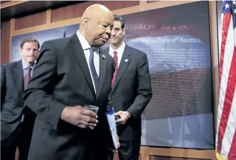  ?? MANUEL BALCE CENETA/THE ASSOCIATED PRESS ?? Rep. Elijah Cummings, ranking member on the House Oversight Committee, leaves a news conference on Capitol Hill in Washington, D.C., on Thursday. Documents released by lawmakers show former national security adviser, Michael Flynn, was warned when he...