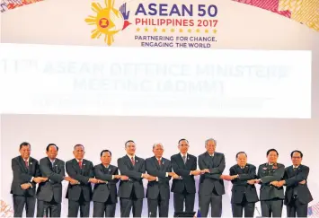  ?? ?? SECRETARY Delfin Lorenzana, together with the other ASEAN delegates during the 11th ASEAN Defense Ministers’ Meeting (ADMM) (23 October 2017)