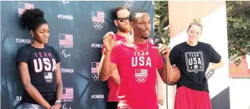  ??  ?? Team USA Rugby wing Carlin Isles with fellow US Olympians as he speaks at an event making the two-year countdown to the Summer Games in Tokyo, in Los Angeles, California, US. — Reuters photo