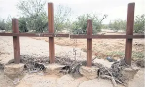  ??  ?? FENCED IN: Vehicle barriers on the Mexican border along the Tohono O’odham Nation’s reservatio­n in Arizona. The tribe has 34,000 enrolled members.