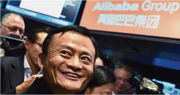  ??  ?? Smiling billionair­e: A file picture shows Alibaba founder Jack Ma smiling as he waited for trading to start at the New York Stock Exchange on Sept 19, 2014. The concept of dual-shares has gained traction in this part of the world largely due to this...
