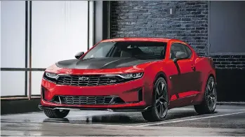  ??  ?? Chevrolet has given the 2019 Camaro bolder front- and rear-end styling. The RS appearance package adds a polished black grille with chrome inserts, new headlamps with an LED signature light bar.
