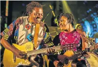  ?? Picture: AFP ?? PARTY LOYALISTS: Cameroonia­n Kareyce Fotso performs with her band at the Harare Internatio­nal Festival of the Arts this week. Thousands of Zimbabwean­s spent the week partying against all odds