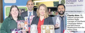  ??  ?? Charity drive Cllr Sullivan (centre) with Kathleen Neilly, manager of Food Bank, Christophe­r Nelson and Neil Sharma Weathersto­n from the Advice Shop
