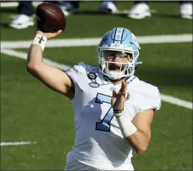  ?? ASSOCIATED PRESS FILE PHOTO ?? North Carolina quarterbac­k Sam Howell has thrown for 2,631 yards and 23 touchdowns through eight games. The No. 25 Tar Heels(6-2) take on No. 2 Notre Dame (8-0) Friday.