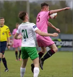  ??  ?? Shane Barnes shields the ball from defender Kieran Butler.