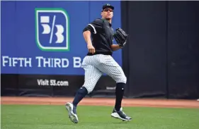  ?? DOUGLAS DEFELICE/USA TODAY SPORTS ?? Yankees outfielders fielder Aaron Judge, seen Feb. 21, and Giancarlo Stanton are likely to miss New York’s opener on March 26.