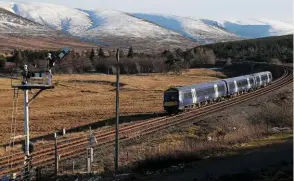  ?? PHIL METCALFE. ?? ScotRail 170428 nears Dalwhinnie on March 3 2017, heading south for Edinburgh. On his rail trip around the UK Steve Robbins found SR’s Edinburgh‘s service on the line to be seriously overcrowde­d.