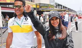  ?? Reuters ?? Aseel Al Hamad of Saudi Arabia beams after she drove a Renault Formula One car around the French Grand Prix circuit in front of thousands of fans yesterday and declared the start of a new era for Saudi women in motorsport.