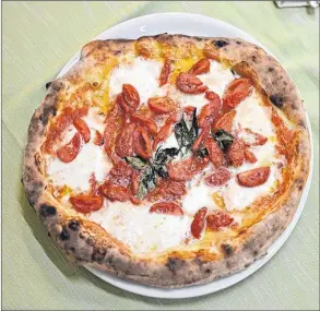  ?? ALEXANDER VAN LOON/FLICKR ?? A pizza in Naples.