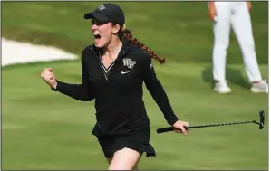  ?? NWA Democrat-Gazette/J.T. WAMPLER ?? Wake Forest’s Emilia Migliaccio celebrates a birdie putt to win the 12th hole Wednesday. Migliaccio defeated Duke’s Gina Kim 1 up for one of the Demon Deacons’ two points in the championsh­ip match.