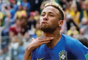  ?? REUTERS ?? MUCH MALIGNED: Brazil’s Neymar celebrates scoring their second goal yesterday, but also received a yellow card for his impetuous behaviour.