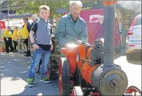  ?? Photograph: Alan Windram. ?? Dylan Ross and Harry Clyne with the scale model of a 1907 Tasker road tractor.