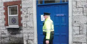  ??  ?? A Garda reporting for duty mid morning on Monday walks past a closed Sligo Garda Station on Pearse Road. Pics: Carl Brennan.