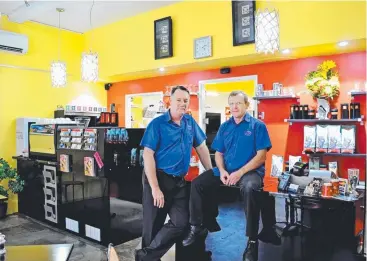  ??  ?? MORNING GLORY: Restaurate­urs Jeff Merange and Bernard Attwood are selling Edge Hill Coffee Shotz Café, which is smack bang in the centre of the village.