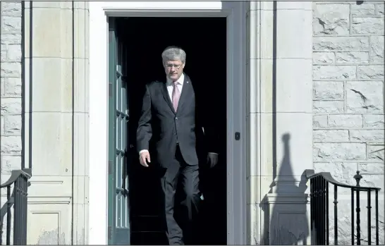  ?? CANADIAN PRESS FILES ?? Prime Minister Stephen Harper steps out of his residence at 24 Sussex Drive. The proper name of the residence is Gorffwysfa.