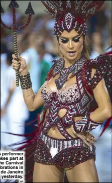  ?? AP ?? A performer takes part at the Carnival celebratio­ns in Rio de Janeiro yesterday.