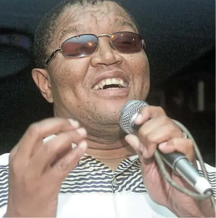  ??  ?? Dr Steve Kekana who has suffered blindness since the age of five is a singer, lawyer and academic.