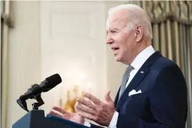  ?? AP PHOTO/ALEX BRANDON ?? President Joe Biden speaks about the 2021 jobs report Friday in the State Dining Room of the White House.