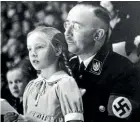  ?? AP ?? In this March 6, 1938 file photo, Chief of the German Police and Minister of the Interior Heinrich Himmler, with his daughter Gudrun.