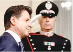  ??  ?? Prime Minister-designate Giuseppe Conte arrives to speak with media at the Quirinal Palace in Rome, on Wednesday. — Reuters