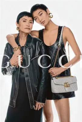  ?? Courtesy of Gucci ?? Houston dentist and former Houston Chronicle Best Dressed honoree Duyen Nguyen stars in a Mother’s Day ad campaign for Gucci with model daughter Chloé.