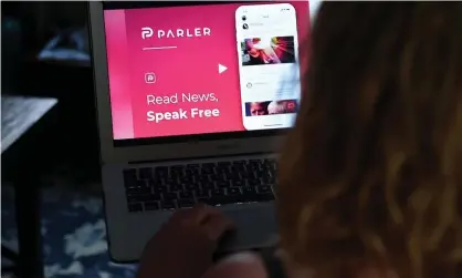  ?? Photograph: Olivier Douliery/AFP/Getty Images ?? Parler had already suffered a major hit to its reach over the weekend, as first Google and thenApple suspended its app from their stores.