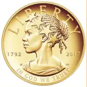  ?? — Reuters ?? The new $100 gold coin featuring an AfricanAme­rican woman as the face of Lady Liberty for the first time in the history of US currency, is shown in this photo in Washington, DC, provided by the United States Mint.