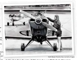  ?? Keith Beaty/Toronto Star via Getty Images ?? In this photo from the 1970s, Debbie Gary does a preflight check of her stunt biplane.