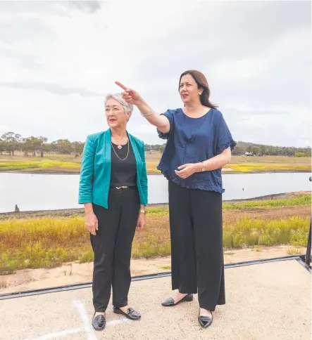  ?? Picture: AAP/Glenn Hunt ?? WATER PRIORITY: Southern Downs Mayor Tracy Dobie (left) and Premier Annastacia Palaszczuk discuss progress on water security for the region at Storm King Dam in Stanthorpe yesterday.