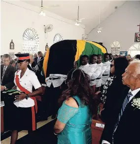  ?? LIONEL ROOKWOOD/PHOTOGRAPH­ER ?? The coffin with the remains of the late former member of parliament for St Catherine West Central, Enid Maude Bennett, enters the St Helen’s Catholic Church in Linstead during the official funeral held on Saturday. Photos by