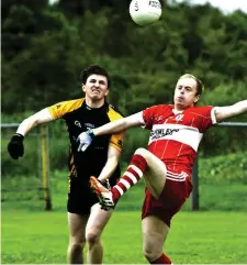  ??  ?? Cathal Mullaney of Enniscrone/Kilglass and Ballymote’s Mark Irwin.